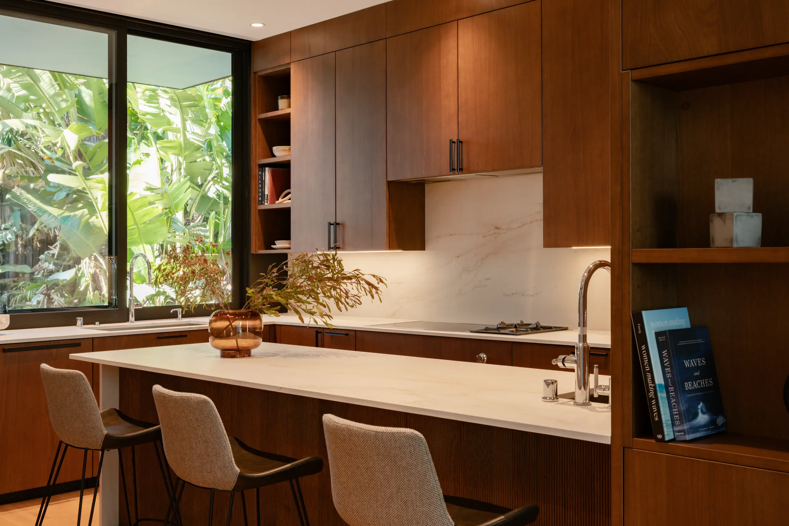 Warm contemporary DOCA kitchen in natural wood cabinetry