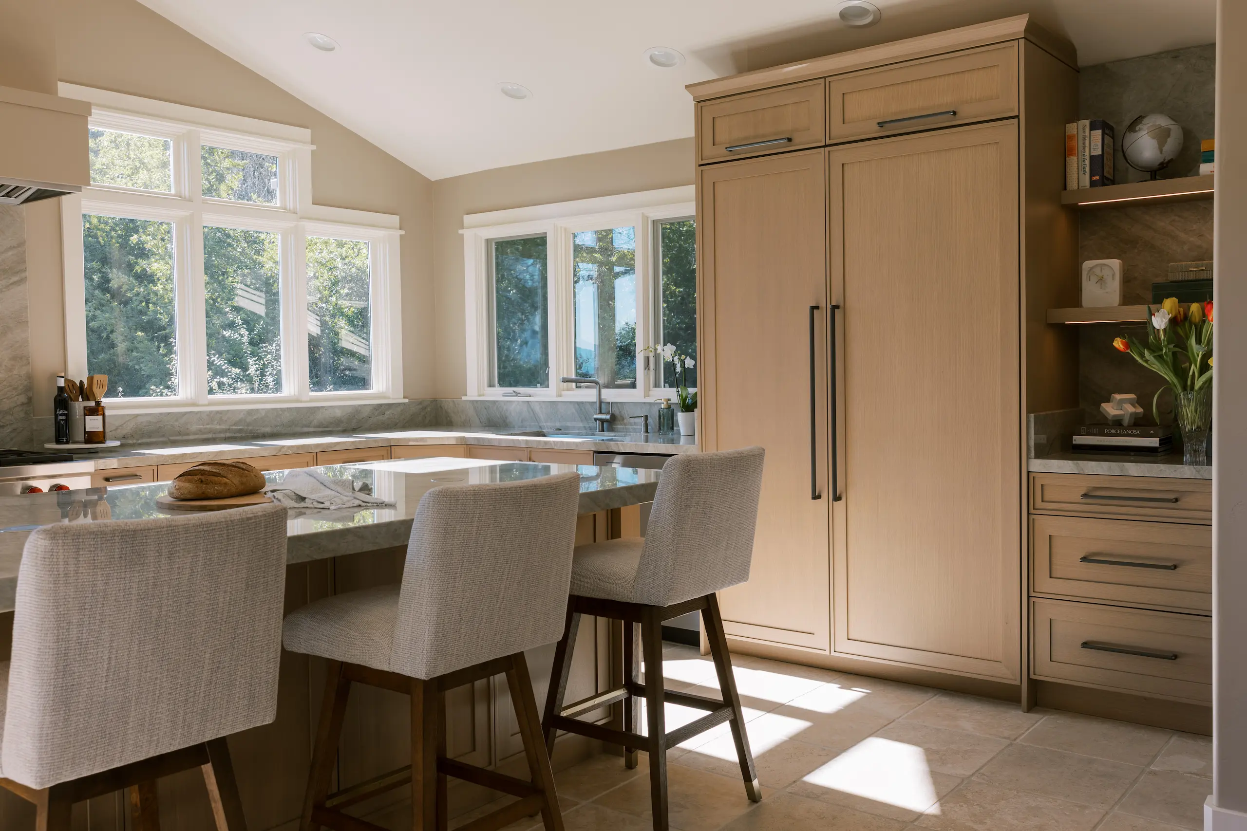 Light-filled Wood-Mode kitchen with refined custom cabinetry