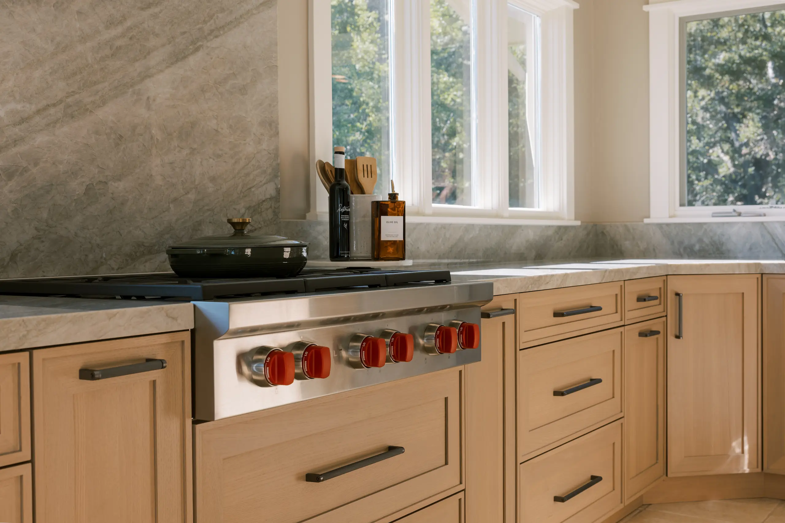 Light-filled elegant Wood-Mode kitchen with custom cabinetry
